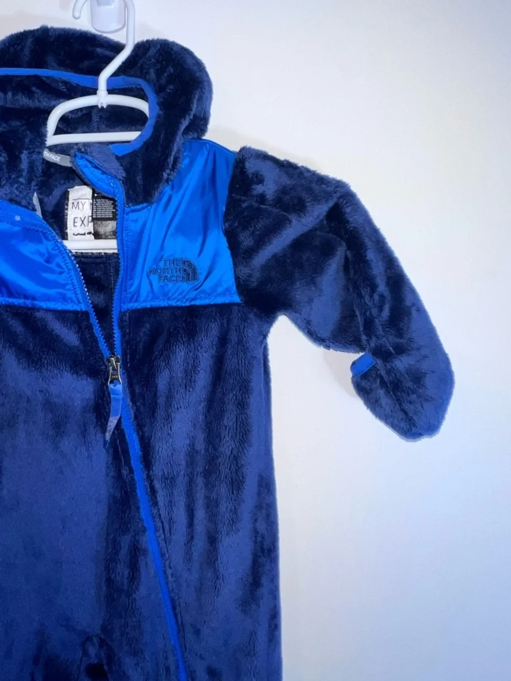 The North Face layer keeps logo